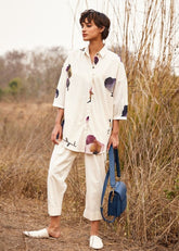 A Model Wearing White Cotton Mul Cascade fling Shirt,curated by Only Ethikal